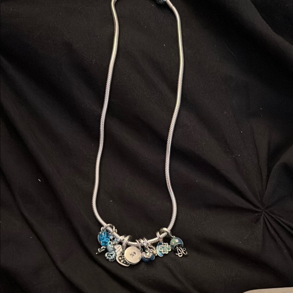 Authentic Pandora moments necklace with charms
